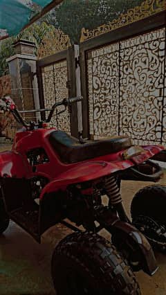 quad-bike (red colour) used