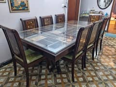 Beautiful 8 seater dining table + China cabinet