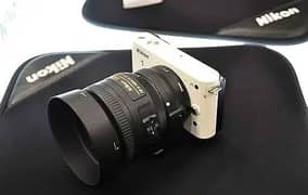 Nikon 1 J1 Mirrorless with Nikon 50mm f1.8G, 10-30mm VR & 30-110mm VR