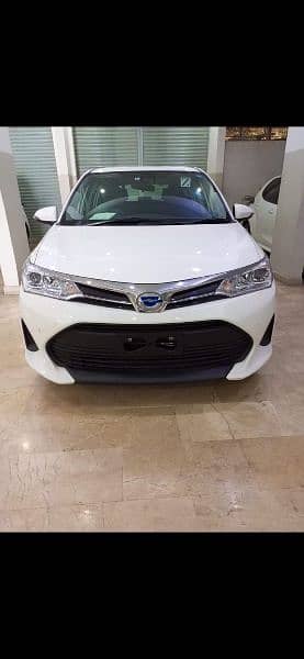 Toyota Corolla Axio Fielder 2020/2024 Import white color 1