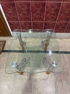 double layered glass table with gold accents 0