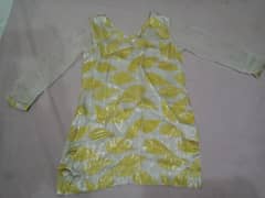 Two piece yellow stitched suit. Short shirt & trouser