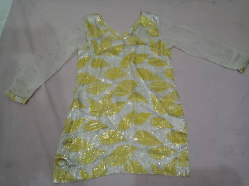 Two piece yellow stitched suit. Short shirt & trouser 0
