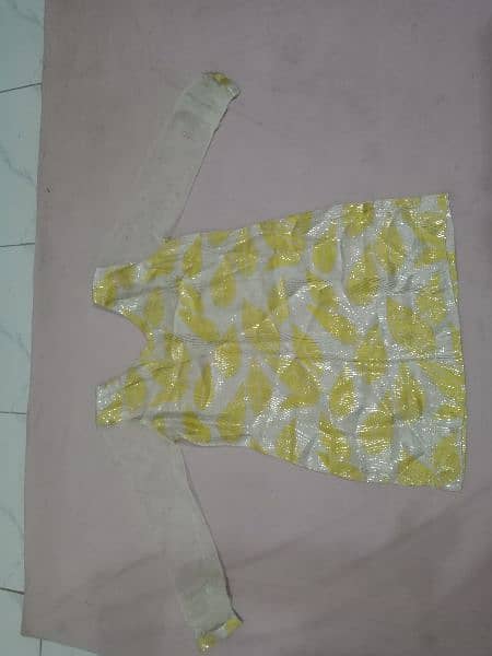 Two piece yellow stitched suit. Short shirt & trouser 2