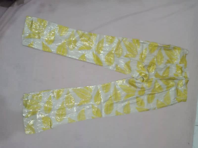 Two piece yellow stitched suit. Short shirt & trouser 5