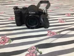 Panasonic lumix camera includes charger and memory card 03212061185 0