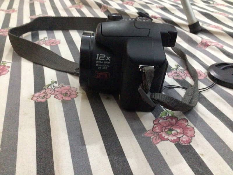 Panasonic lumix camera includes charger and memory card 03212061185 1