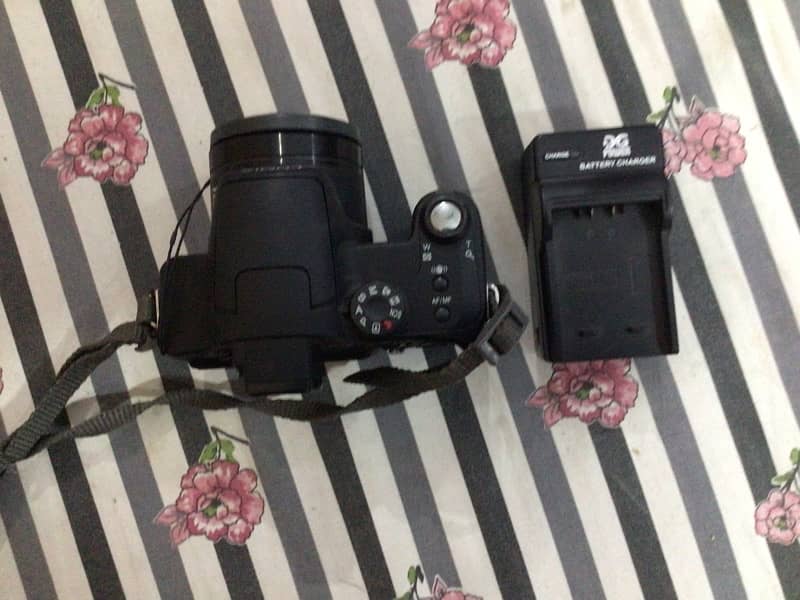 Panasonic lumix camera includes charger and memory card 03212061185 3