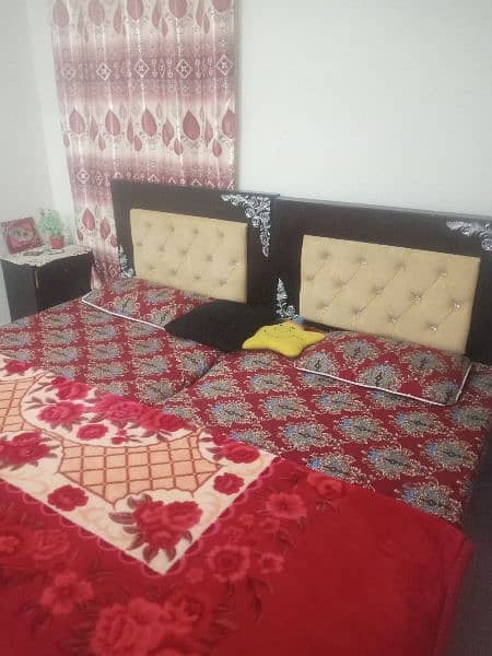 2 x single beds with mattress  and 1 side table 1