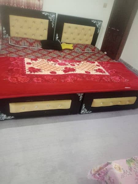 2 x single beds with mattress  and 1 side table 2