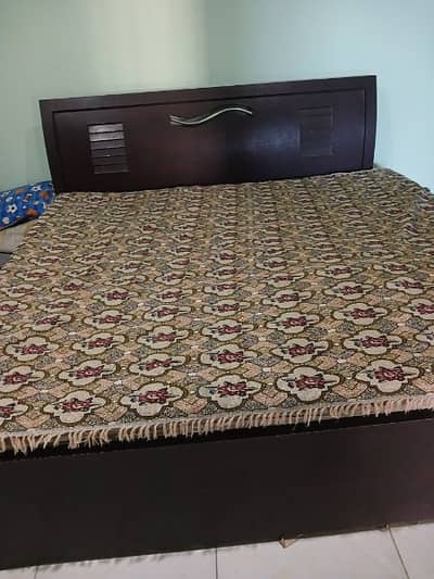 Bed with Good condition and cupboards
