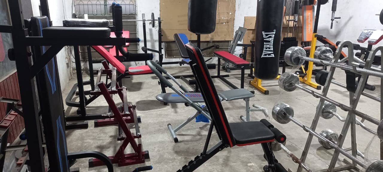 multiple bench press benches dumbbell  plate rod treadmill elliptical 11