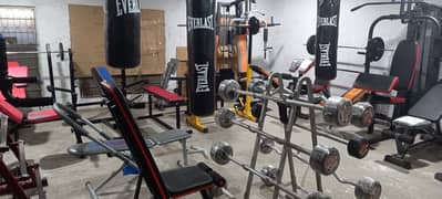 multiple bench press benches dumbbell  plate rod treadmill elliptical 0