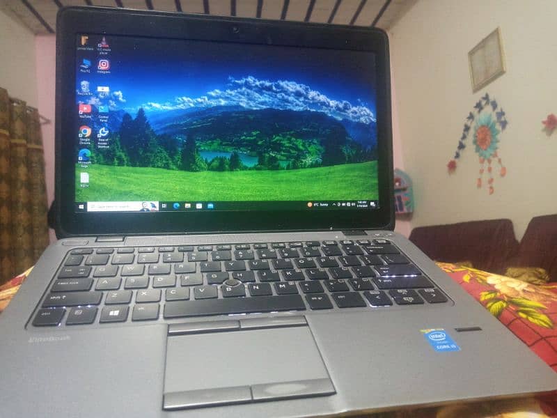 •HP EliteBook Slim Laptop with Intel Core i5-5200U TurboBoost Proc. . 1