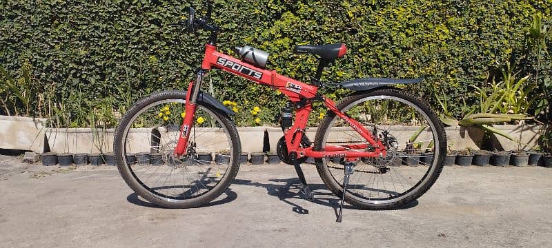 Red Sports Mountain Bike - Foldable (Like New) 0