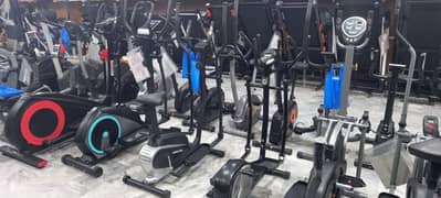 Exercise bike Elliptical Cros Trainer full body workout dumbbell plate