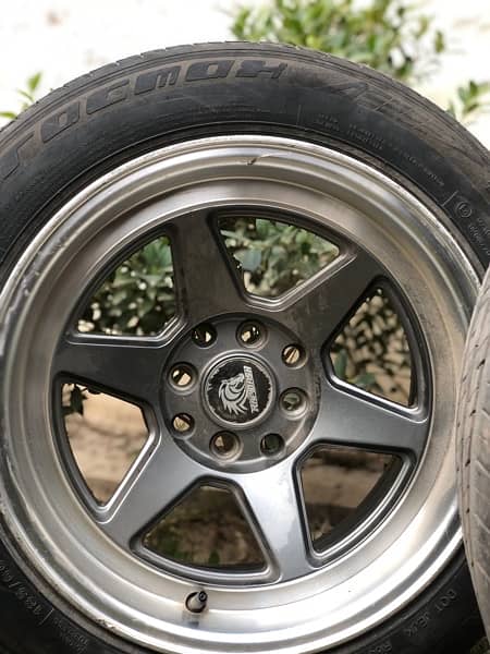 15 inch tyres condition 10/10 tyres and project rims both for sale 1