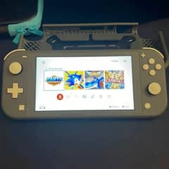 Nintendo switch lite grey colour with charger and cover 128 gb card