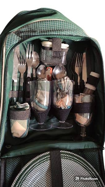 picnic bag with access i. e. plates spoons glasses forks knives etc 1