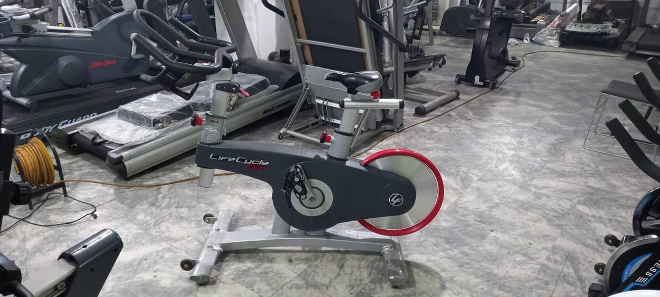 Life Fitness treadmill | elliptical | spin bike | dumbbell rod plate 7
