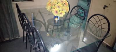 glass table and iron rod 6 chairs