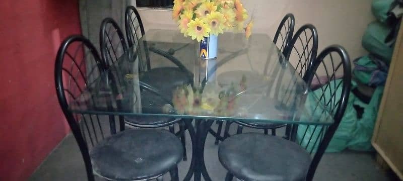 glass table and iron rod 6 chairs 1