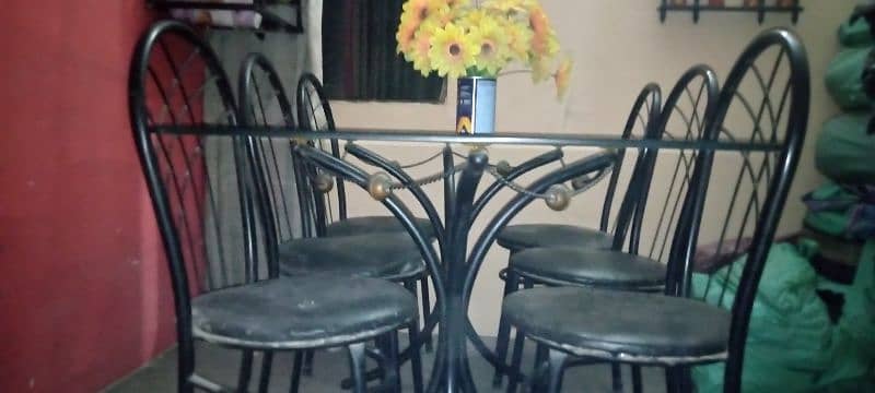 glass table and iron rod 6 chairs 2