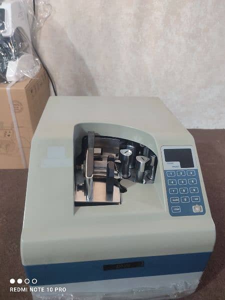 cash counting machines bundle packet note counting machine in Pakistan 17