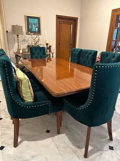 wood dining table. for 8. high gloss hardner finish top, gold legs. 0
