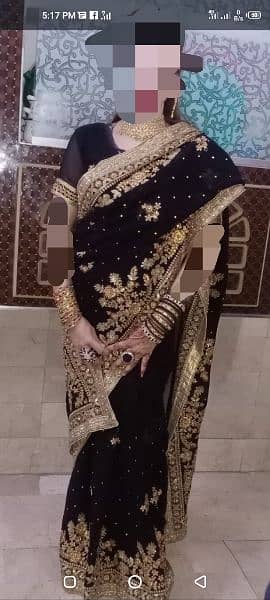 black full huvey embroidery sari 1