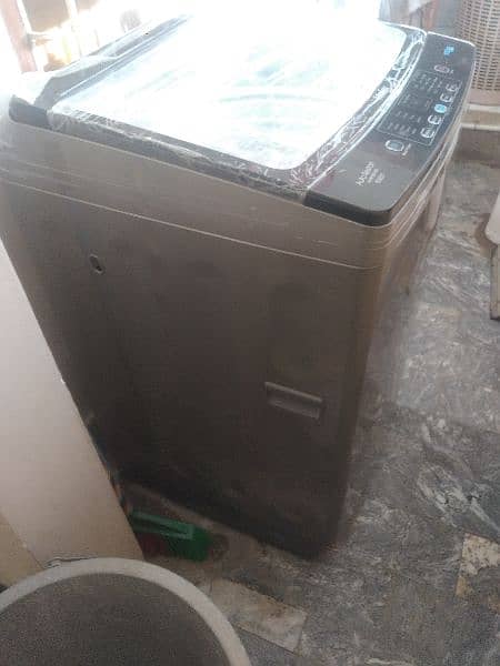 Haier washing machine 150 Kg. 1