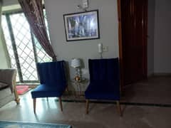 2 bed room chairs with table