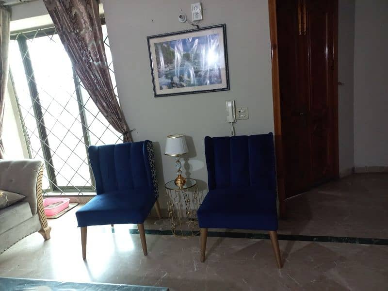 2 bed room chairs with table 1