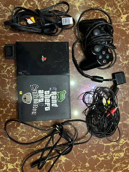 Playstation 2 console with controller 0