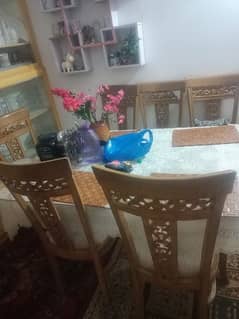 glass top dining table with 6 chairs urgent sale