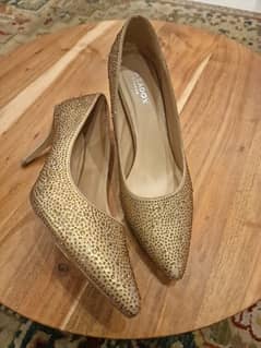paradox London gold heels