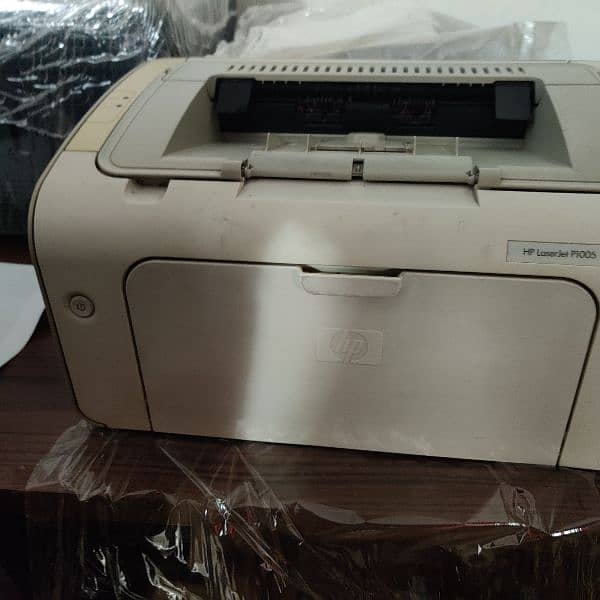 HP Laserjet Printer Model P1005. Good Condition. New Toner 3
