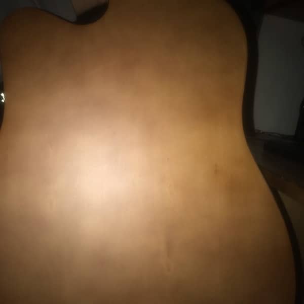 Acoustic jumbo size guitar 1