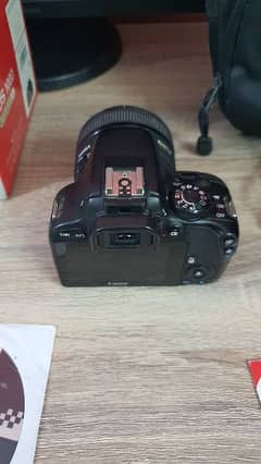 100D Canon Dslr camera slightly used like new, 30mm lens Sigma F1.4