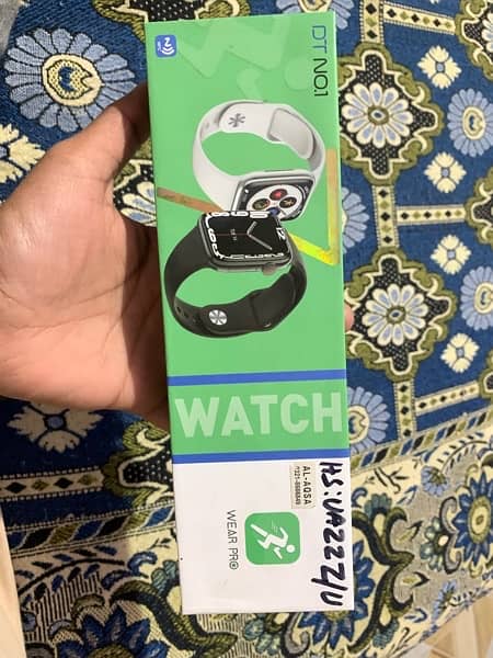 DT ON 1 smart watch with original box and charger 2