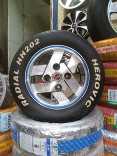 BRAND NEW TYRES WITH SLIGHTLY USED RIMS FOR SUZUKI MEHRAN AND HIROOF