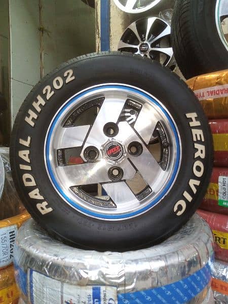 BRAND NEW TYRES WITH SLIGHTLY USED RIMS FOR SUZUKI MEHRAN AND HIROOF 1