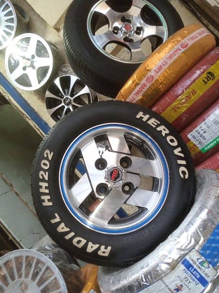 BRAND NEW TYRES WITH SLIGHTLY USED RIMS FOR SUZUKI MEHRAN AND HIROOF 2