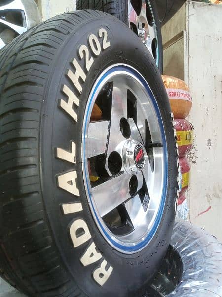 BRAND NEW TYRES WITH SLIGHTLY USED RIMS FOR SUZUKI MEHRAN AND HIROOF 3