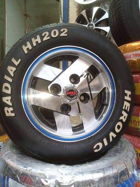 BRAND NEW TYRES WITH SLIGHTLY USED RIMS FOR SUZUKI MEHRAN AND HIROOF 5