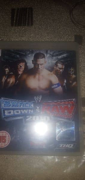 ps3 smack down vs raw 2010 game disc