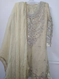 golden Heavy embroidered Shirt with gharara and golden dupatta