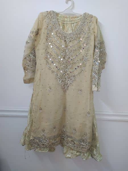golden Heavy embroidered Shirt with gharara and golden dupatta 1