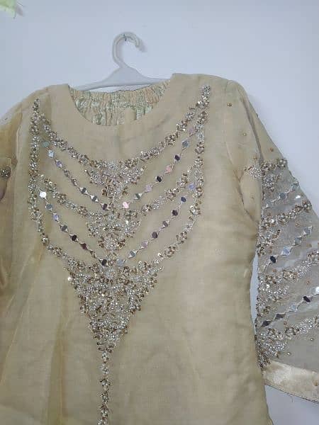 golden Heavy embroidered Shirt with gharara and golden dupatta 7