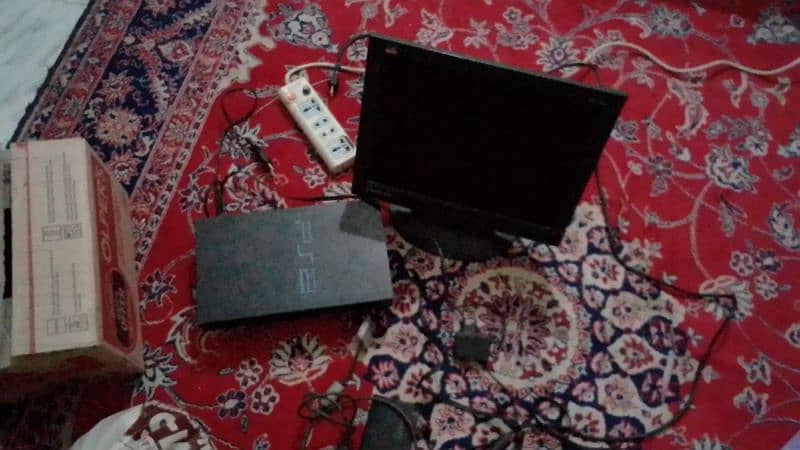 Playstation 2 game with 4 remote complete wires and steering,break pad 1